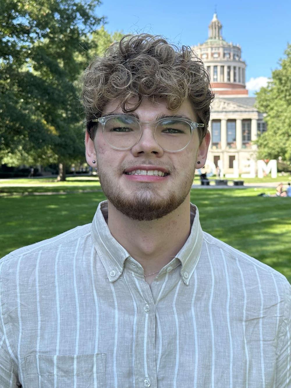 Riley Prewett with Rush Rhees Library in the background.